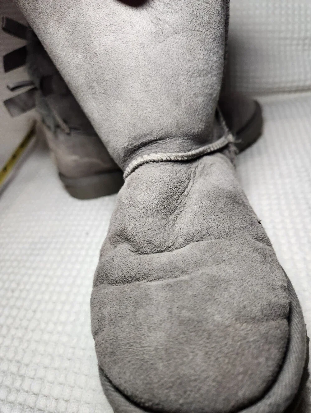 UGG Gray Bow Back Shearling Boots Flawed